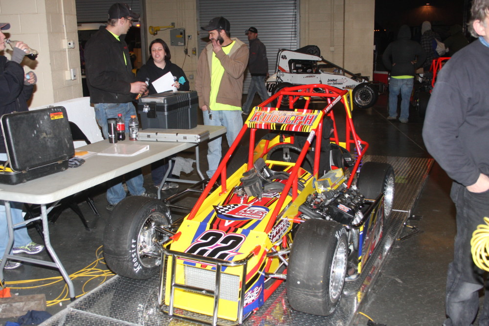 The car of Erick Rudolph goes over the scales to verify he meets the minimum weight requirement.